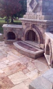 elaborate-brick-paver-outdoor-fireplace image